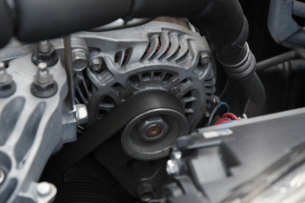 honda alternator repair, auto repair in Groveland, FL at Griffis Automotive Clinic, Inc. Close-up image of a vehicle alternator.